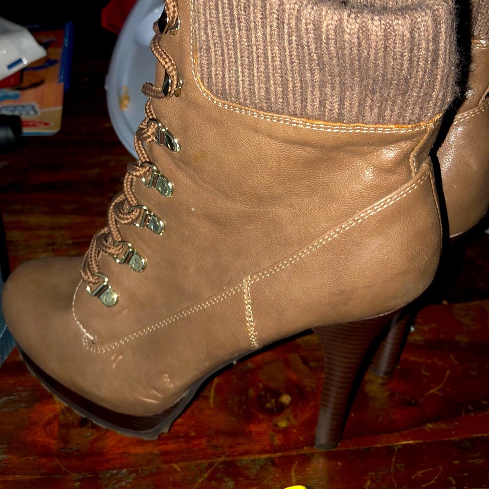 Brand new size 7 1/2 high heeled ankle boots